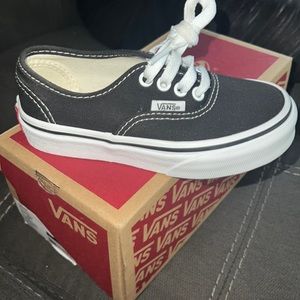 Brand New / Never Worn/ size 11 kids / Black and White .